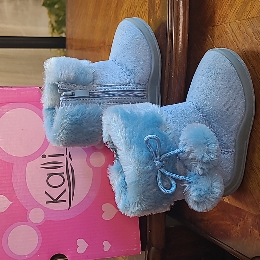 New in box! Kali Girls size 5 baby sky blue boots with pom pom tassels